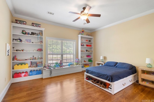 10 Lakewood Park Dr, North Little Rock, AR 72116 - bedroom featuring visible vents, a ceiling fan, crown molding, and wood finished floors