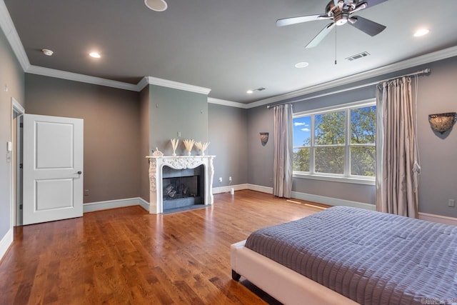 10 Lakewood Park Dr, North Little Rock, AR 72116 - bedroom with crown molding, baseboards, and wood finished floors