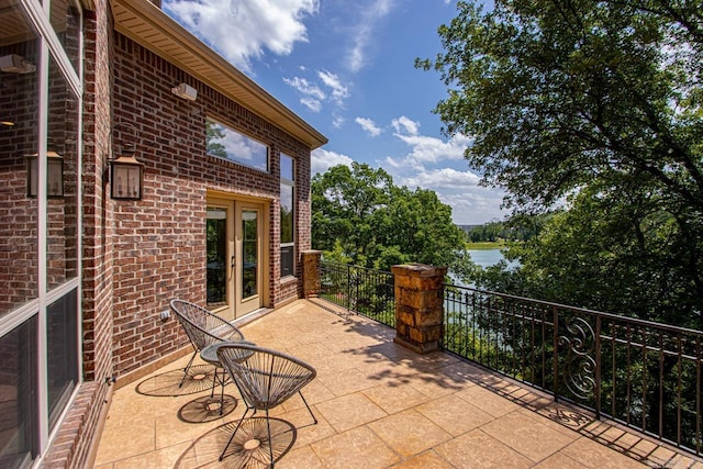 10 Lakewood Park Dr, North Little Rock, AR 72116 - view of patio with a water view, french doors, and a balcony