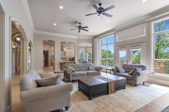 10 Lakewood Park Dr, North Little Rock, AR 72116 - living room featuring a healthy amount of sunlight, arched walkways, and recessed lighting
