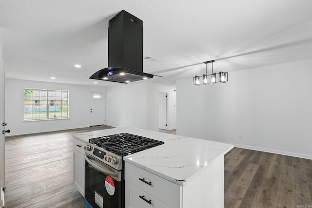 300 Dryad Ln, Little Rock, AR 72205 - kitchen featuring wood finished floors, open floor plan, island range hood, stainless steel range with gas cooktop, and white cabinetry