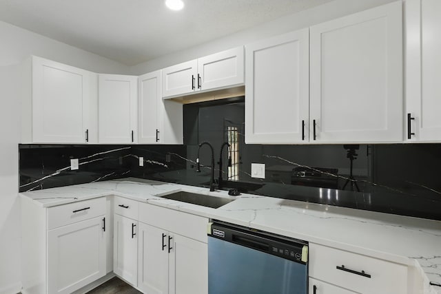 300 Dryad Ln, Little Rock, AR 72205 - kitchen with backsplash, white cabinetry, a sink, and dishwashing machine