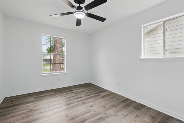 300 Dryad Ln, Little Rock, AR 72205 - empty room featuring baseboards, a ceiling fan, and wood finished floors