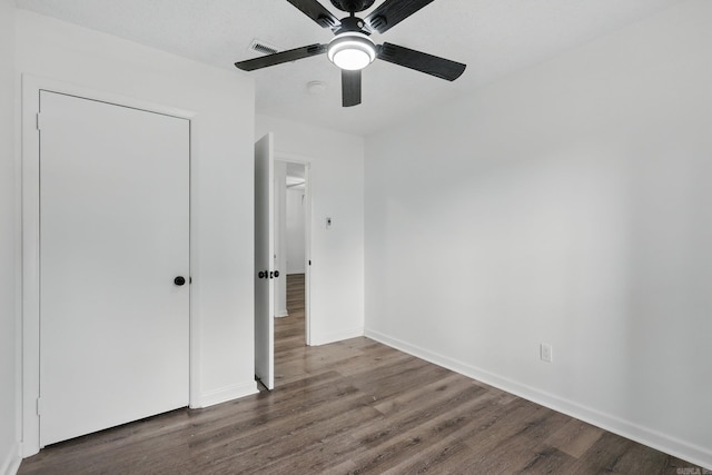 300 Dryad Ln, Little Rock, AR 72205 - unfurnished bedroom with baseboards, ceiling fan, wood finished floors, and visible vents