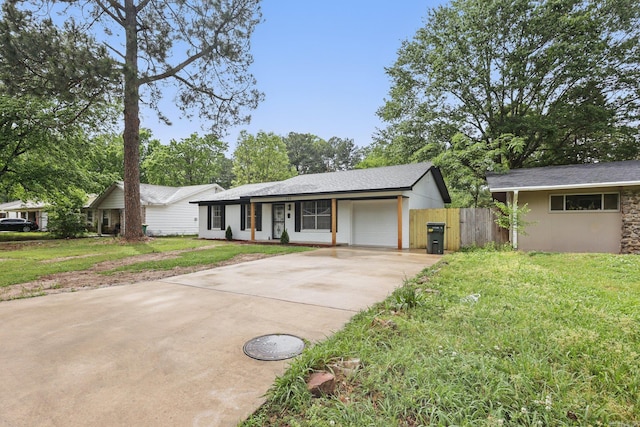 300 Dryad Ln, Little Rock, AR 72205 - single story home featuring an attached garage, fence, a front yard, and concrete driveway