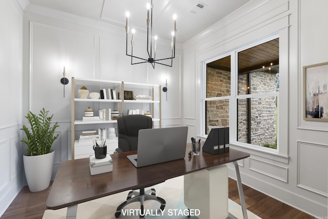 2940 Orchard View Dr, Conway, AR 72034 - office space with visible vents, an inviting chandelier, a decorative wall, and wood finished floors