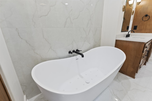 2940 Orchard View Dr, Conway, AR 72034 - bathroom featuring a freestanding tub, marble finish floor, and vanity