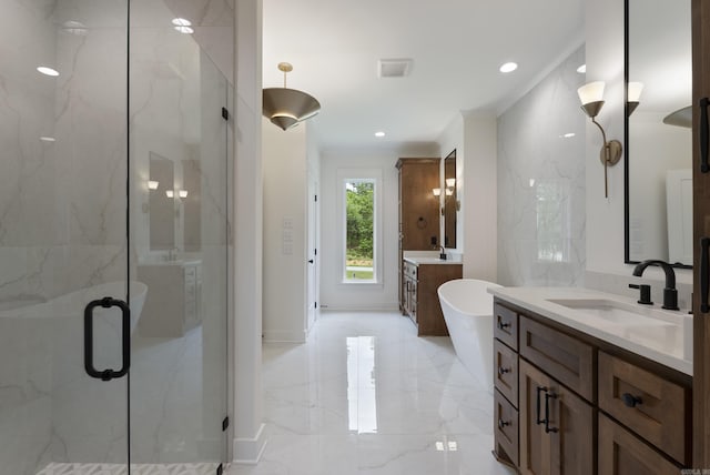 2940 Orchard View Dr, Conway, AR 72034 - full bathroom with a freestanding tub, two vanities, a sink, marble finish floor, and a marble finish shower