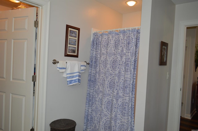 bathroom with curtained shower