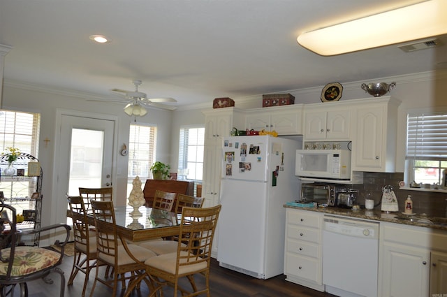 kitchen with visible vents, ornamental molding, white appliances, tasteful backsplash, and a ceiling fan