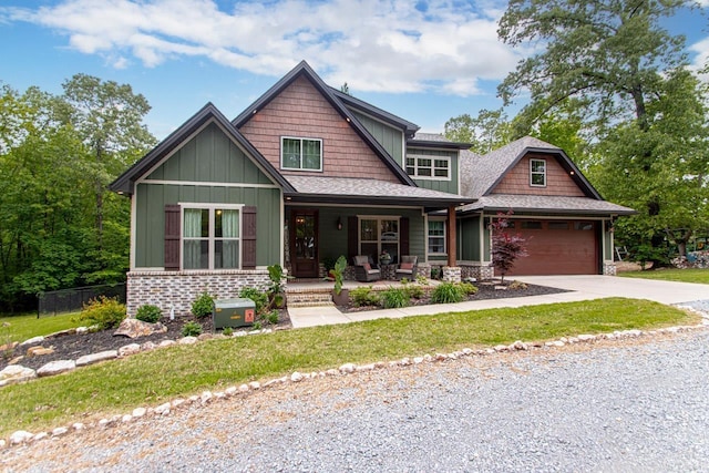 4201 Lovell Ln, Benton, AR 72019 - craftsman inspired home with fence, a garage, board and batten siding, covered porch, and driveway