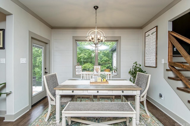4201 Lovell Ln, Benton, AR 72019 - dining area featuring wood walls, baseboards, stairway, a chandelier, and dark wood finished floors