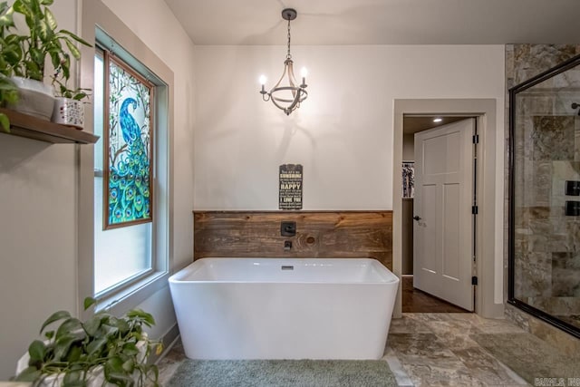 4201 Lovell Ln, Benton, AR 72019 - full bath featuring a chandelier, a freestanding bath, a stall shower, and a healthy amount of sunlight