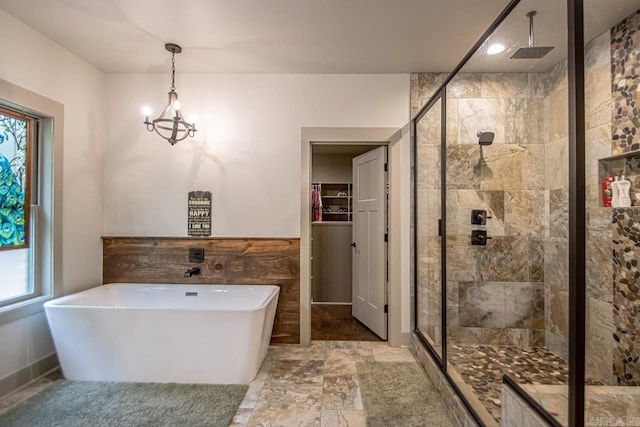 4201 Lovell Ln, Benton, AR 72019 - full bath with a freestanding tub, a notable chandelier, a spacious closet, and a shower stall