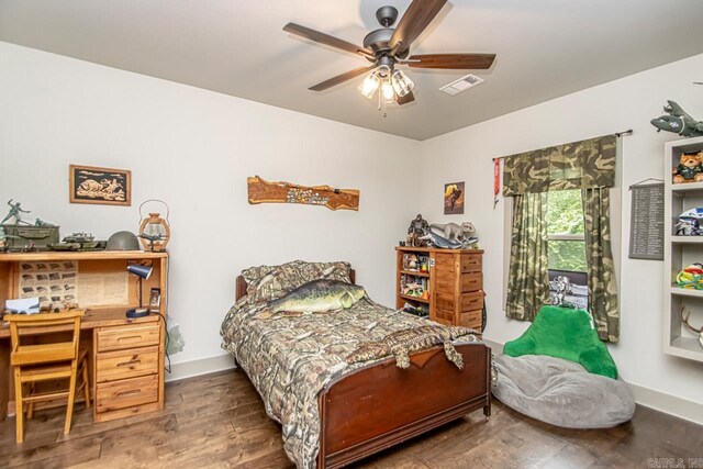 4201 Lovell Ln, Benton, AR 72019 - bedroom featuring a ceiling fan, baseboards, visible vents, and wood finished floors