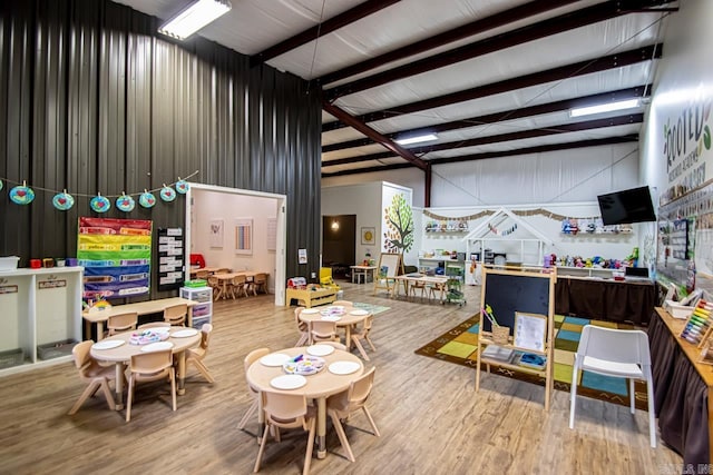 4201 Lovell Ln, Benton, AR 72019 - interior space with high vaulted ceiling and wood finished floors