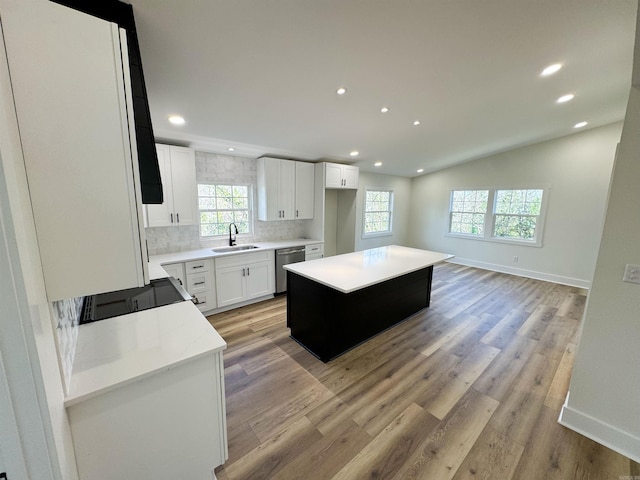 209 Goshen Ave, North Little Rock, AR 72116 - kitchen featuring baseboards, recessed lighting, tasteful backsplash, a sink, and dishwasher
