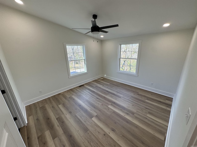209 Goshen Ave, North Little Rock, AR 72116 - unfurnished room with recessed lighting, ceiling fan, dark wood-style floors, and a wealth of natural light