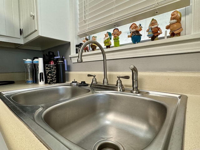 7 Franklin Cir, Searcy, AR 72143 - details with a sink and white cabinets