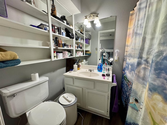 7 Franklin Cir, Searcy, AR 72143 - bathroom with vanity, a shower with curtain, toilet, and wood finished floors