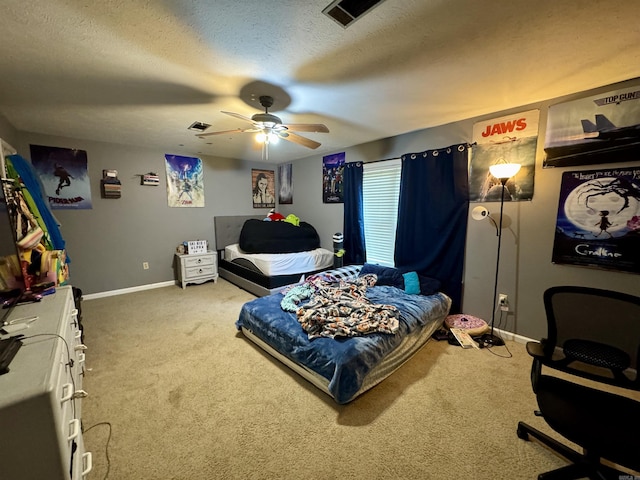 7 Franklin Cir, Searcy, AR 72143 - carpeted bedroom with a textured ceiling, baseboards, visible vents, and ceiling fan