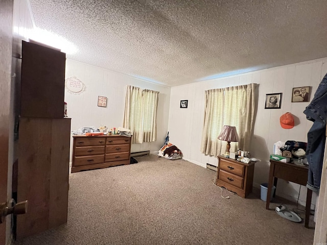 carpeted bedroom with a baseboard radiator and a textured ceiling