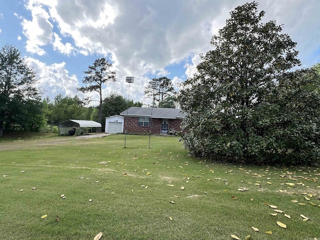 view of yard featuring a carport