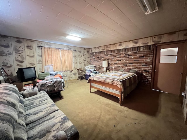 bedroom with concrete flooring and multiple windows