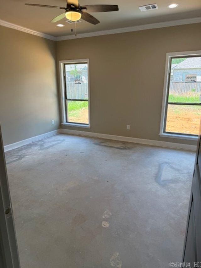 empty room with crown molding, ceiling fan, recessed lighting, baseboards, and visible vents