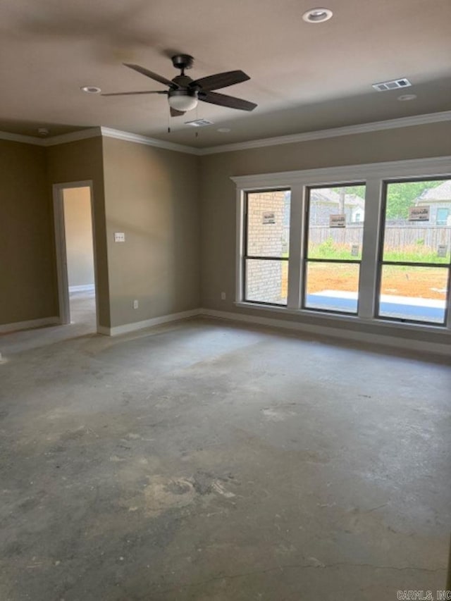 unfurnished room with visible vents, ornamental molding, baseboards, a ceiling fan, and concrete floors