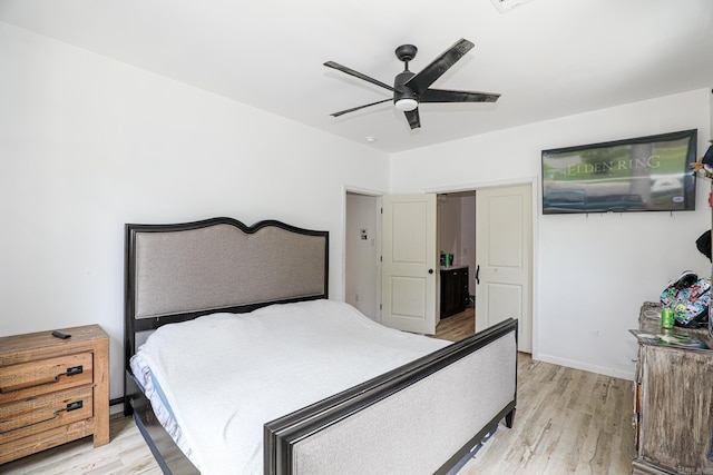 bedroom featuring ceiling fan and light wood finished floors