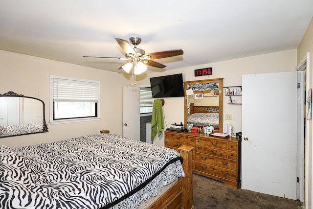 carpeted bedroom featuring ceiling fan