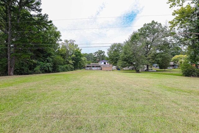 view of yard with a wooden deck