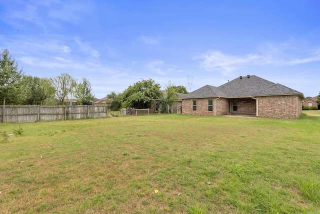 view of yard featuring fence