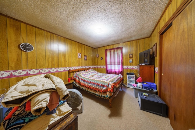 3009 N Main St, Mount Pleasant, AR 72651 - bedroom with wooden walls, carpet floors, and a textured ceiling