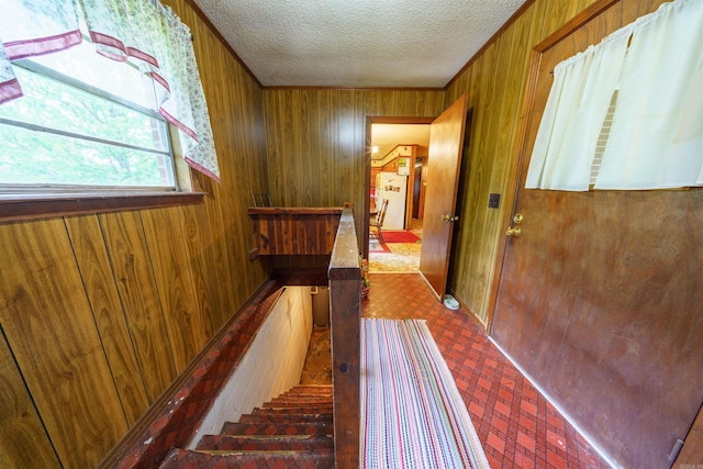 3009 N Main St, Mount Pleasant, AR 72651 - corridor featuring wooden walls and a textured ceiling