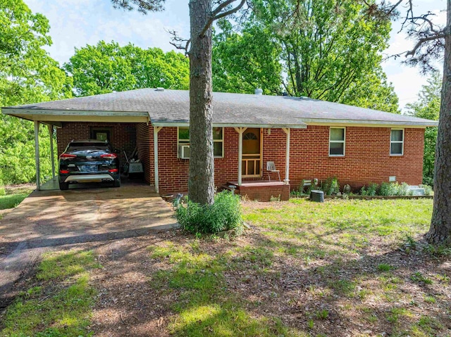 3009 N Main St, Mount Pleasant, AR 72651 - ranch-style home featuring a carport, cooling unit, driveway, and brick siding