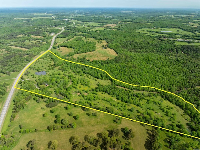 3009 N Main St, Mount Pleasant, AR 72651 - drone / aerial view featuring a wooded view