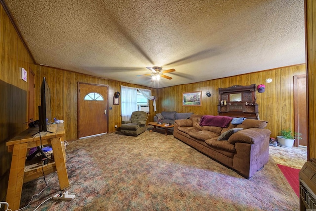 3009 N Main St, Mount Pleasant, AR 72651 - carpeted living area with wooden walls, a ceiling fan, and a textured ceiling