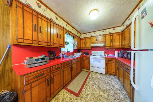 3009 N Main St, Mount Pleasant, AR 72651 - kitchen with brown cabinets, under cabinet range hood, white appliances, and a textured ceiling