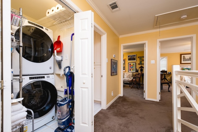 washroom with laundry area, crown molding, stacked washer / dryer, attic access, and carpet