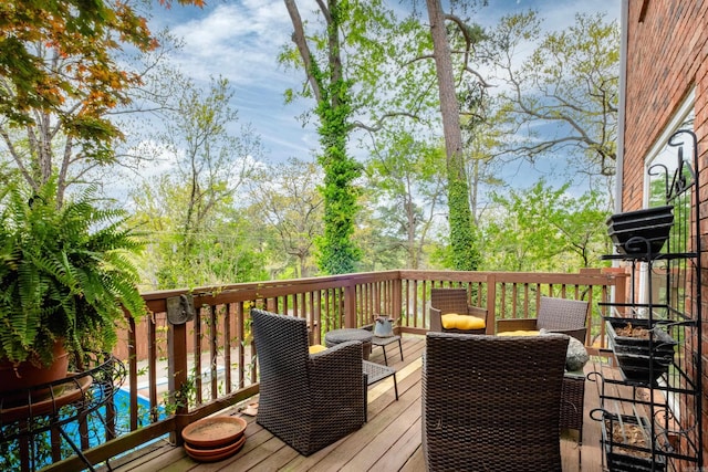 wooden deck with an outdoor hangout area