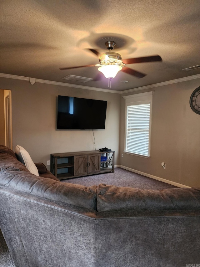 living area with carpet flooring, a textured ceiling, ornamental molding, and baseboards