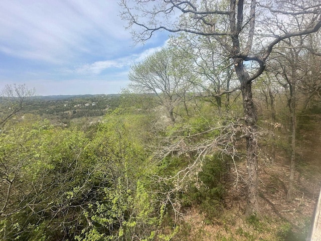 view of landscape with a view of trees