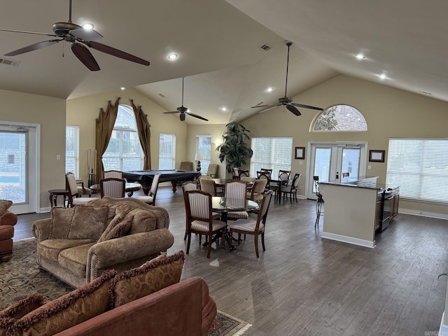living room featuring high vaulted ceiling, ceiling fan, dark wood finished floors, and visible vents
