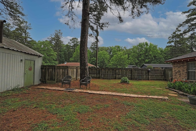 view of yard with a fenced backyard
