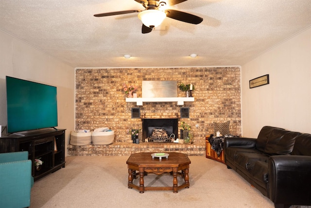 living area with ornamental molding, a textured ceiling, and carpet flooring