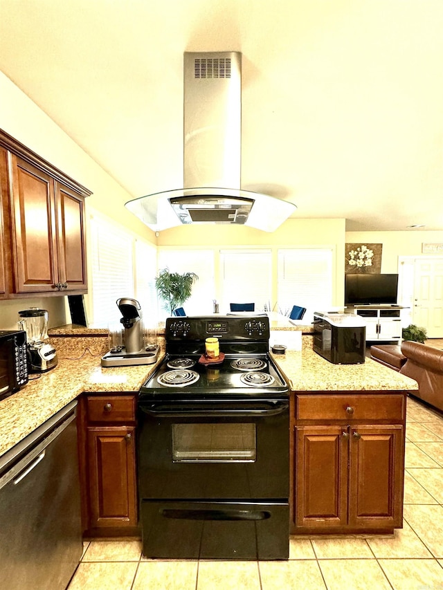 kitchen with island exhaust hood, light stone counters, black appliances, open floor plan, and light tile patterned flooring