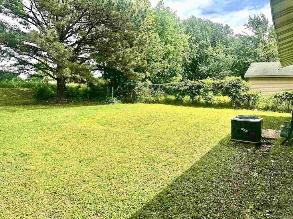 2510 Mary Jane Dr, Jonesboro, AR 72401 - view of yard with central AC