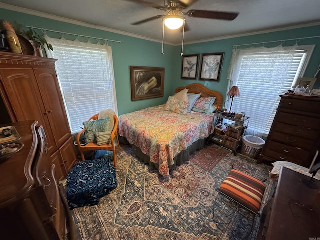 bedroom with crown molding, ceiling fan, and multiple windows
